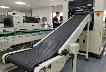 1786257593-smt-production-line-section-with-an-incline-conveyor-bridging-height-gap-between-1786257590196