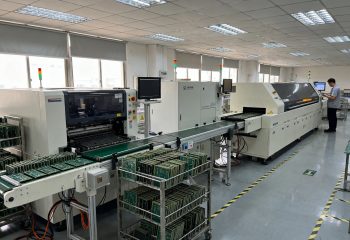 1787636946-smt-production-line-section-showing-pcb-loader-and-unloader-machines-positioned-1787636942517
