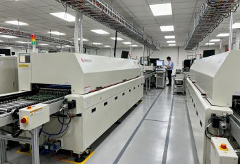 1789541012-wide-shot-of-an-smt-production-line-section-in-an-electronics-factory-showing-an-1789540979898