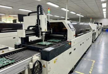 1789630893-electronics-assembly-floor-with-selective-soldering-machine-positioned-inline-be-1789630891207