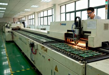 1790152909-factory-floor-documentary-view-of-an-inline-wave-soldering-production-line-conve-1790152907628