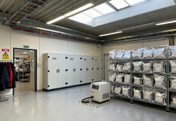1791536808-wide-angle-documentary-photograph-of-an-electronics-factory-stockroom-showing-es-1791536807010