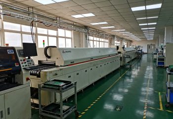 1792711262-wide-documentary-photo-of-an-ordinary-smt-production-line-in-a-working-electroni-1792711262177